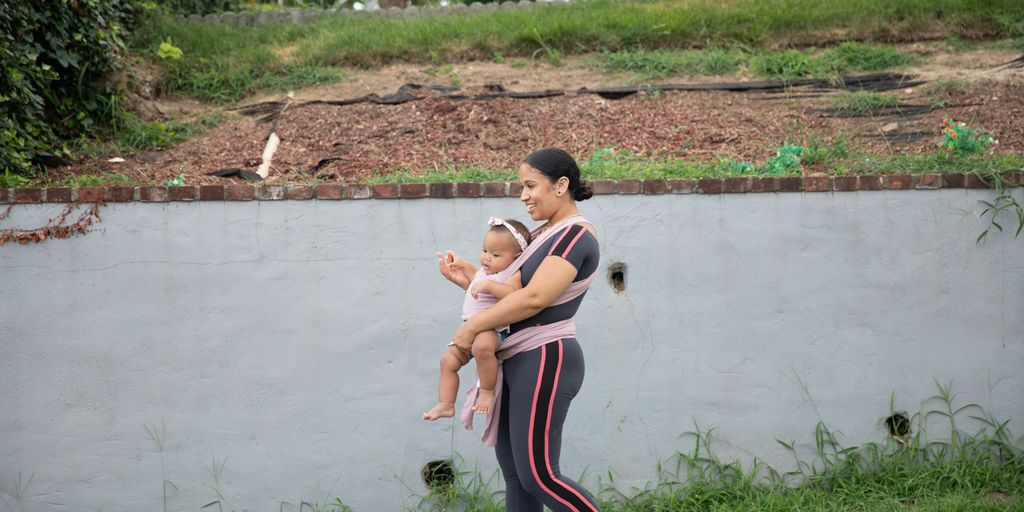 a person holding a baby