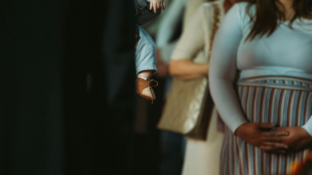 a group of people standing next to each other